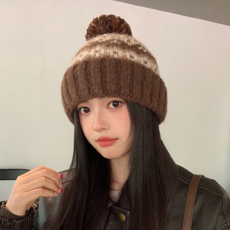 This is a new retro knitted hat for women in winter. It's a Korean style versatile and high-end hooded hat. It's a thickened ear-protecting cold hat for keeping warm Specification image