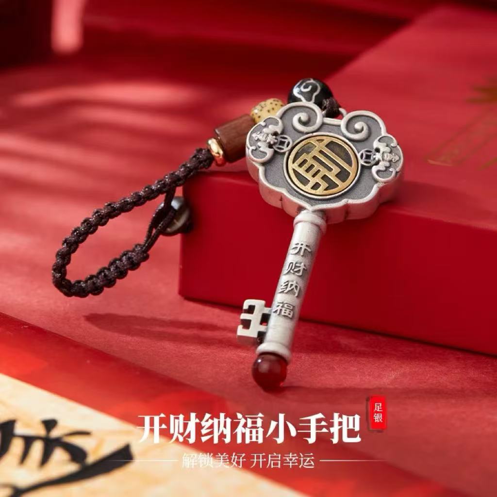 A retro Chinese-style silver pendant with the character "Fu" in the shape of a key, a wealth-attracting accessory Application Scenario
