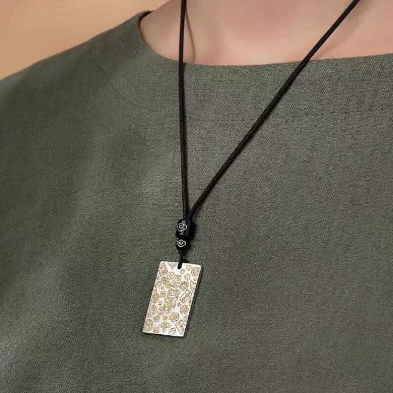 999 pure silver with gold plating, a simple and retro keychain pendant in a traditional Chinese style Application Scenario