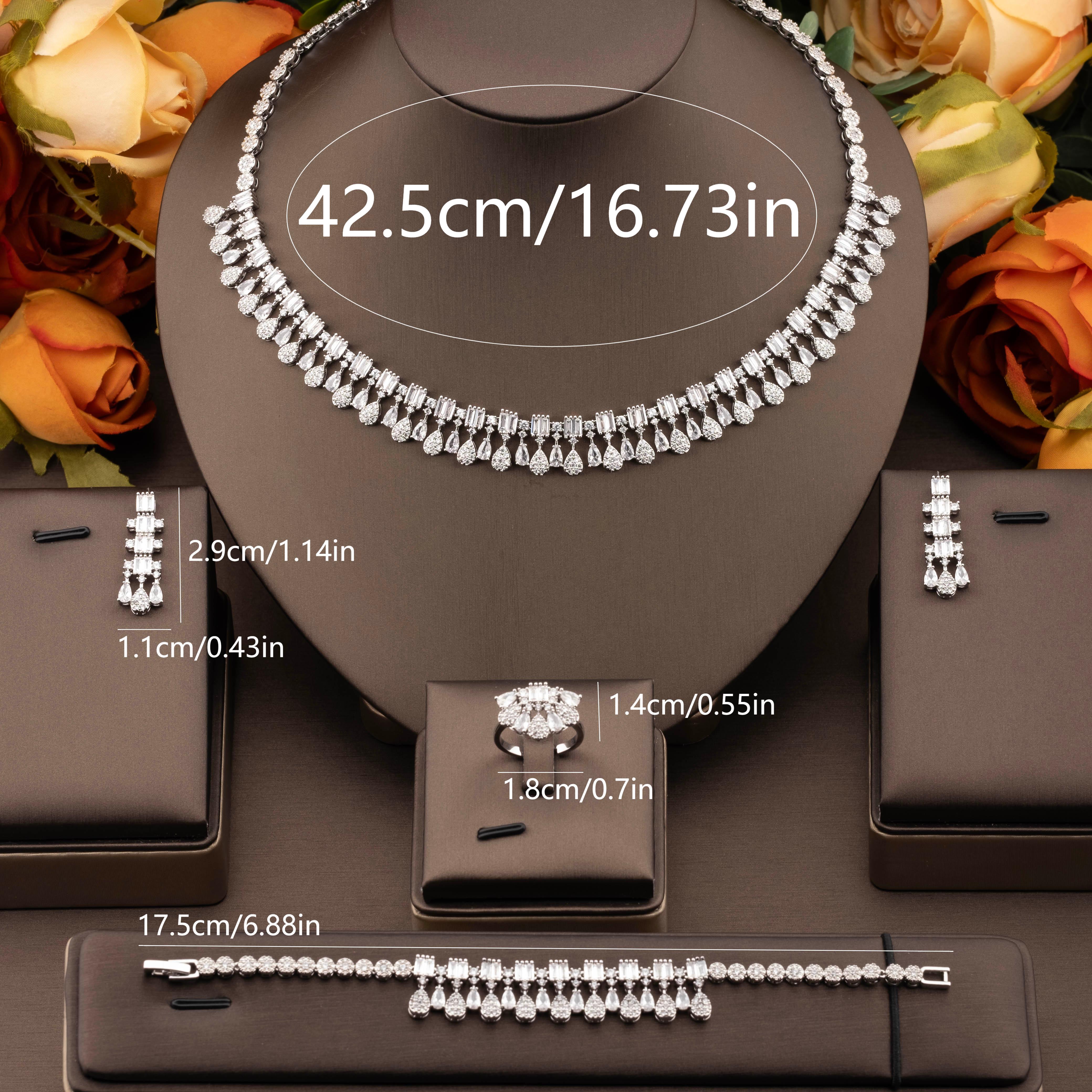 A luxurious and elegant jewelry set set with sparkling cubic zirconia small teardrop pieces is suitable for ladies to wear at parties Item Picture
