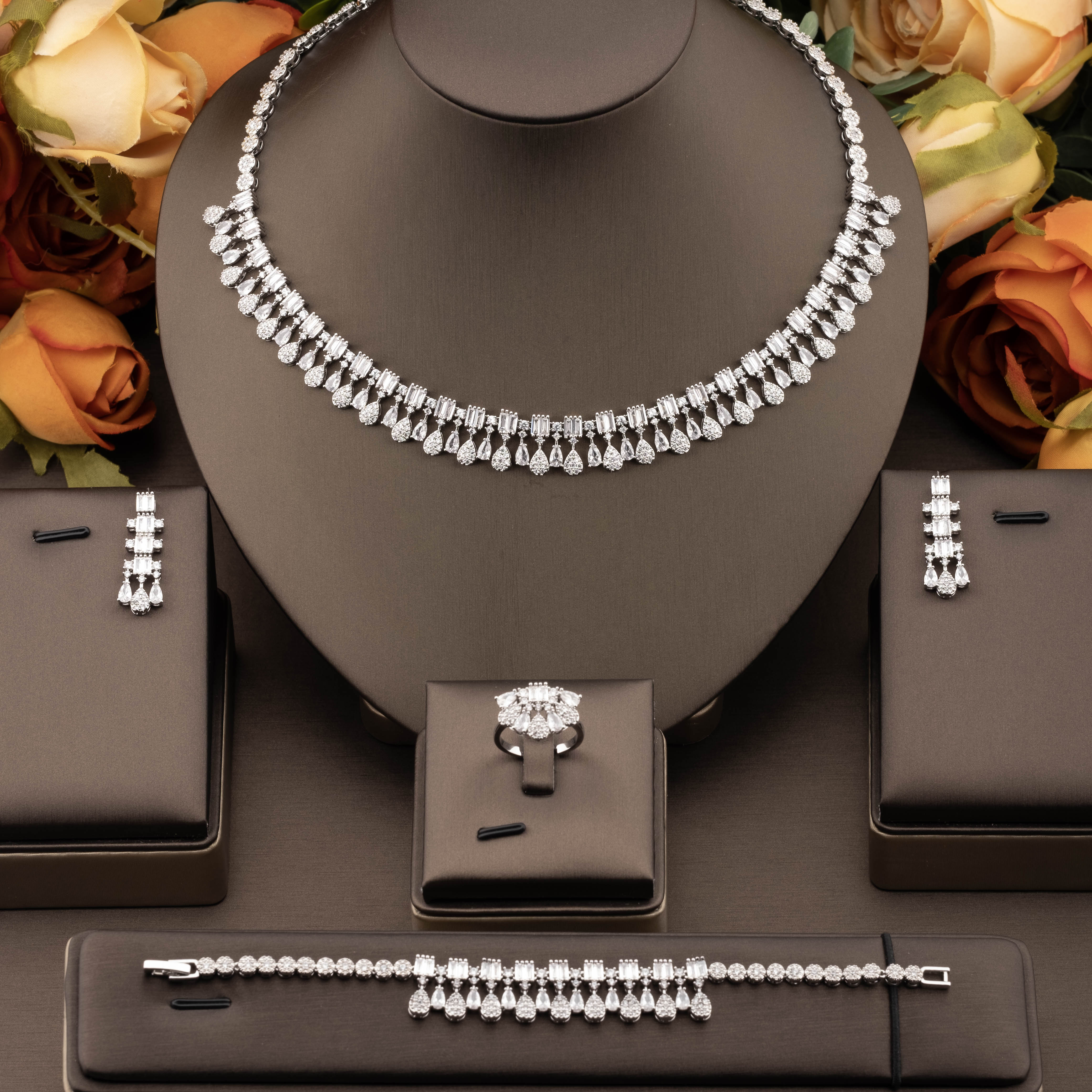 A luxurious and elegant jewelry set set with sparkling cubic zirconia small teardrop pieces is suitable for ladies to wear at parties pic 1