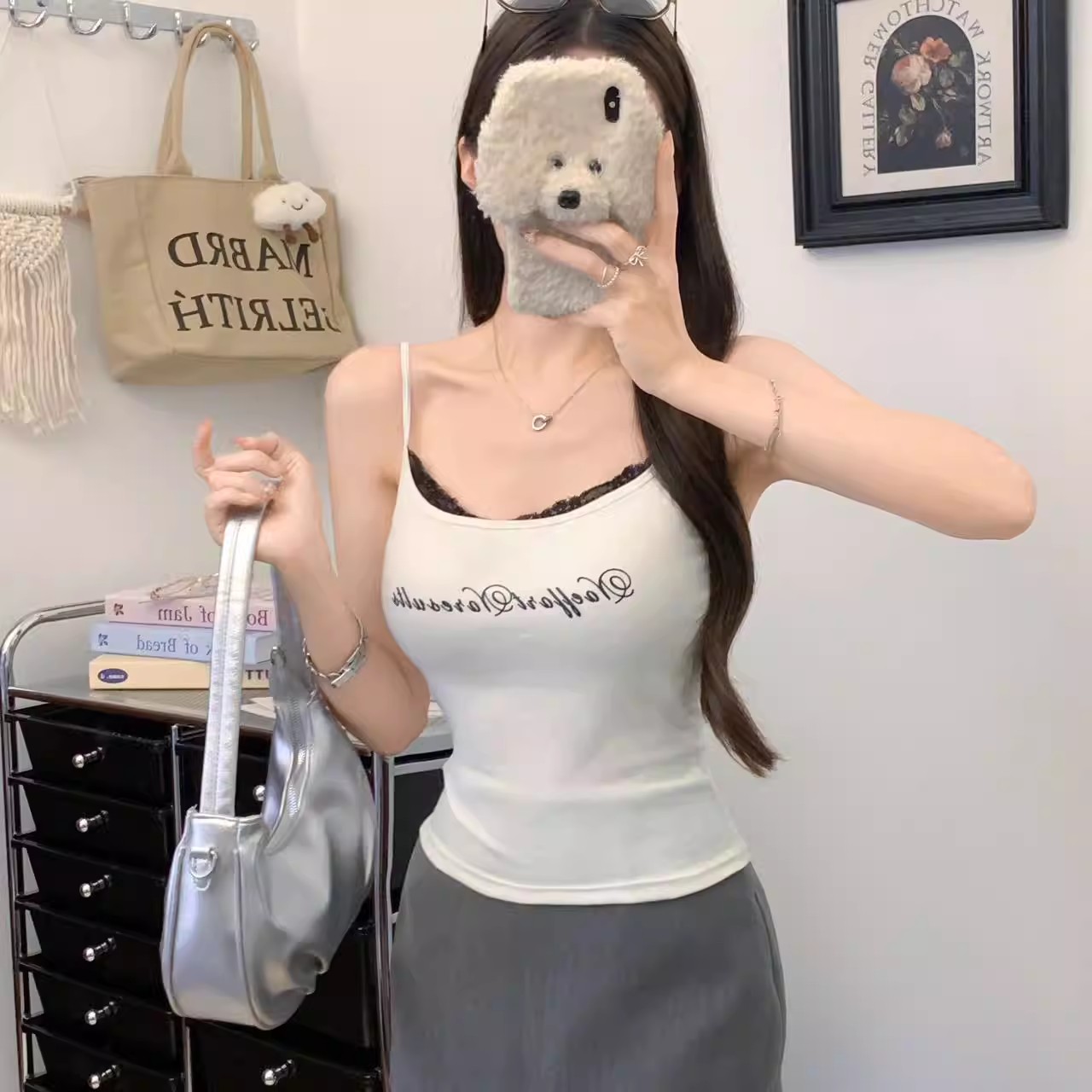 The hot girl patchwork small halter top is a top for women to wear inside and outside with a chest pad and letter-embroidered halter details Picture