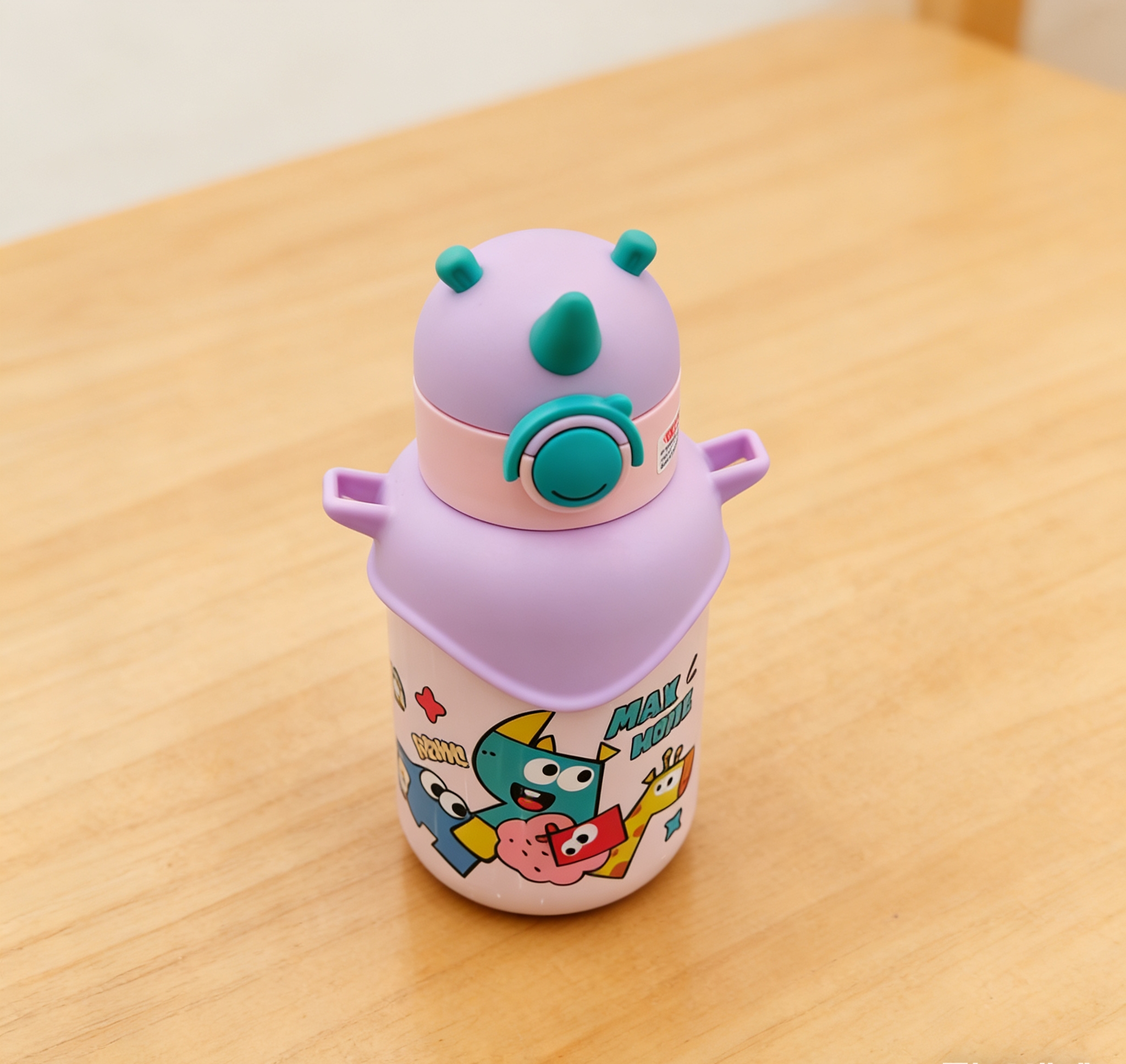 Cartoon pattern dinosaur-shaped children's stainless steel insulated cup with double-ear handle, portable straw insulated water cup wholesale Application Scenario