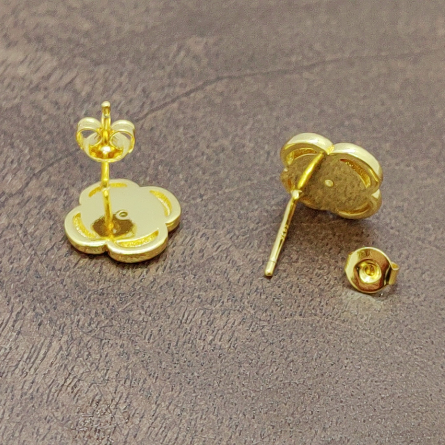 Golden flower ear studs, fashionable earrings, ear sticks, multiple pairs, simple and elegant, versatile women's accessories, white zirconium four-petal flower ear studs, silver needles Application Scenario
