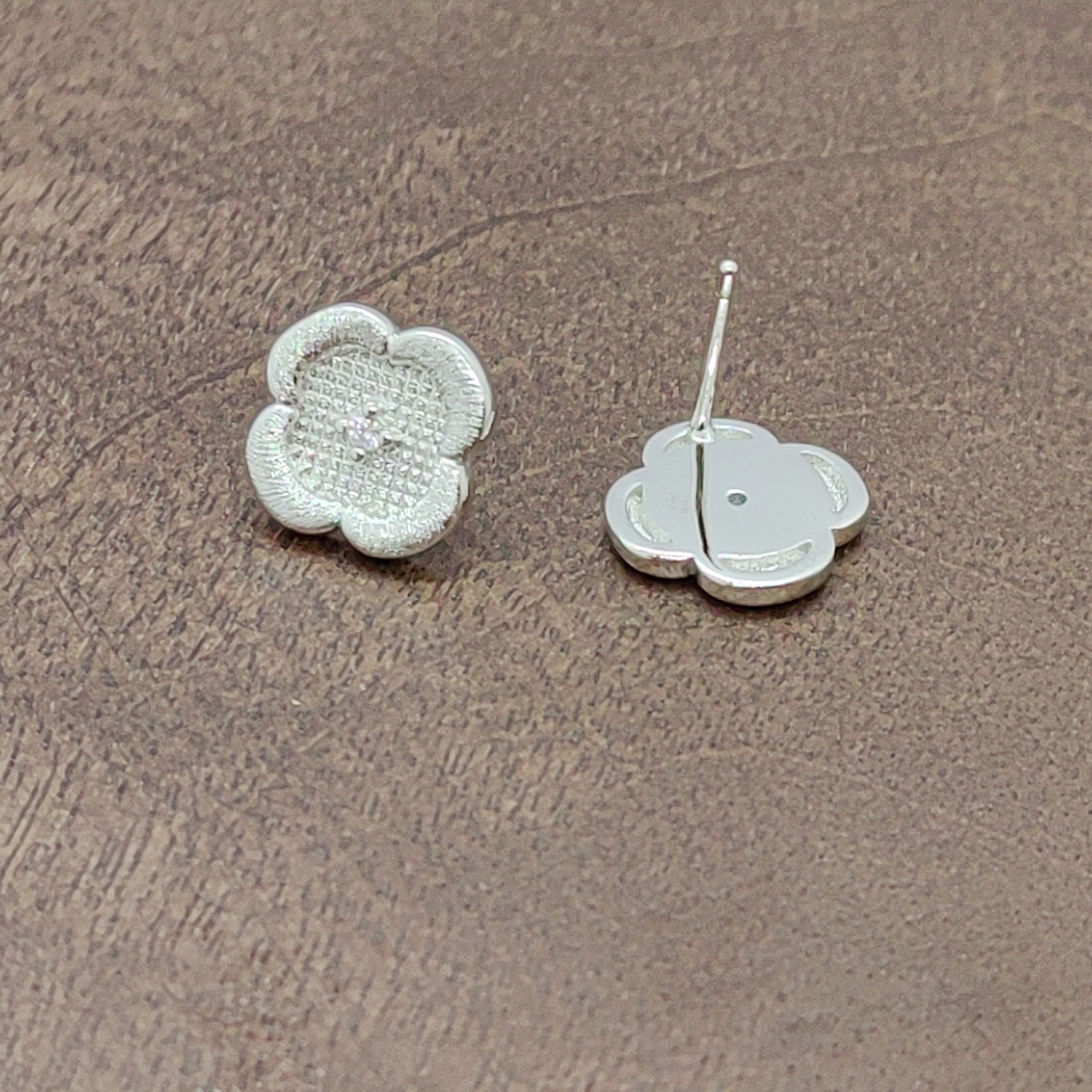 Silver flower-shaped ear stud accessories, earrings, ear sticks, multiple pairs, simple and versatile, fashionable women's style, white zirconium four-petal flower ear stud silver needles Specification image