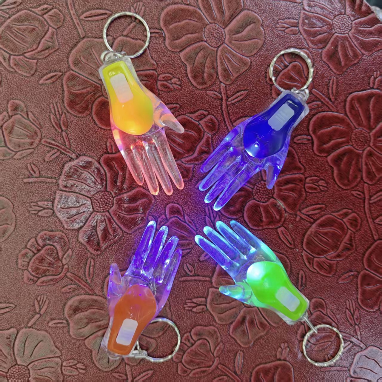 Multi-functional key chain light, colored plastic, women's hand-shaped key chain, Year of the Horse acrylic pendant, small hand pendant, key chain, creative and personalized key accessories manufacturer wholesale