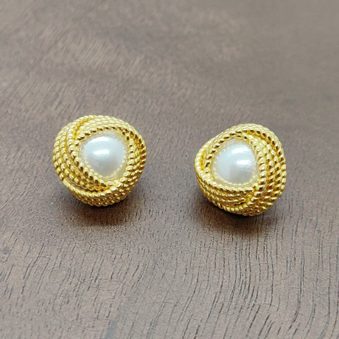 Gold woven beaded ear studs with silver needles