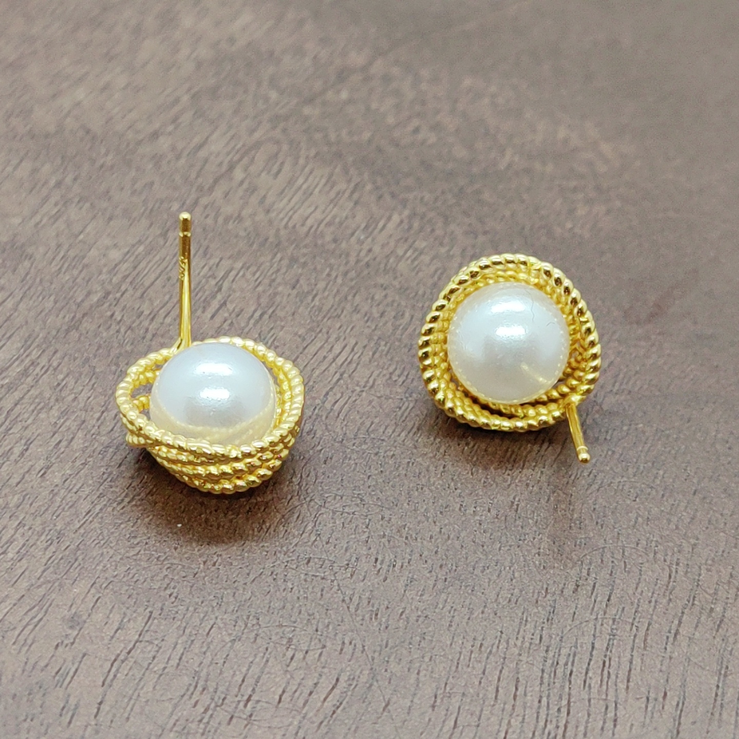 Gold woven beaded ear studs with silver needles details Picture