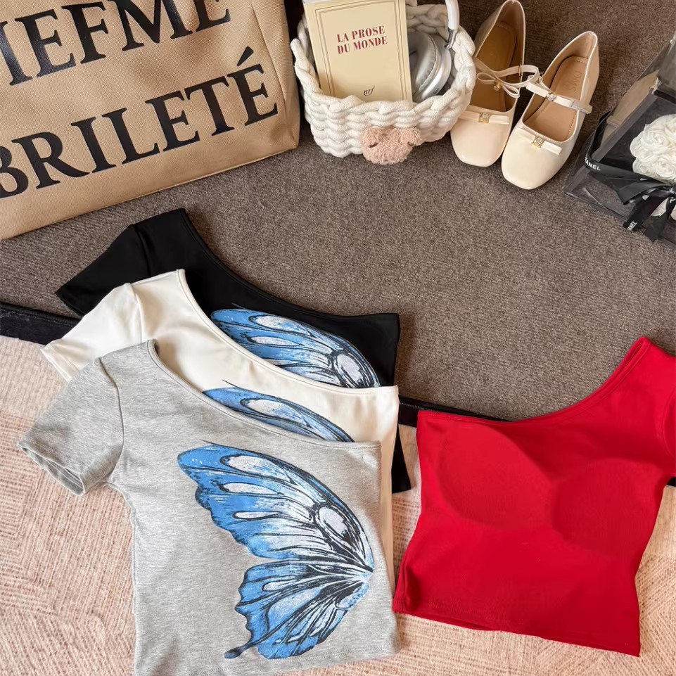 A hot girl style off-the-shoulder butterfly print short-sleeved T-shirt for women. Pair it with a short top with a chest pad for a slimming and form-fitting look in summer Application Scenario