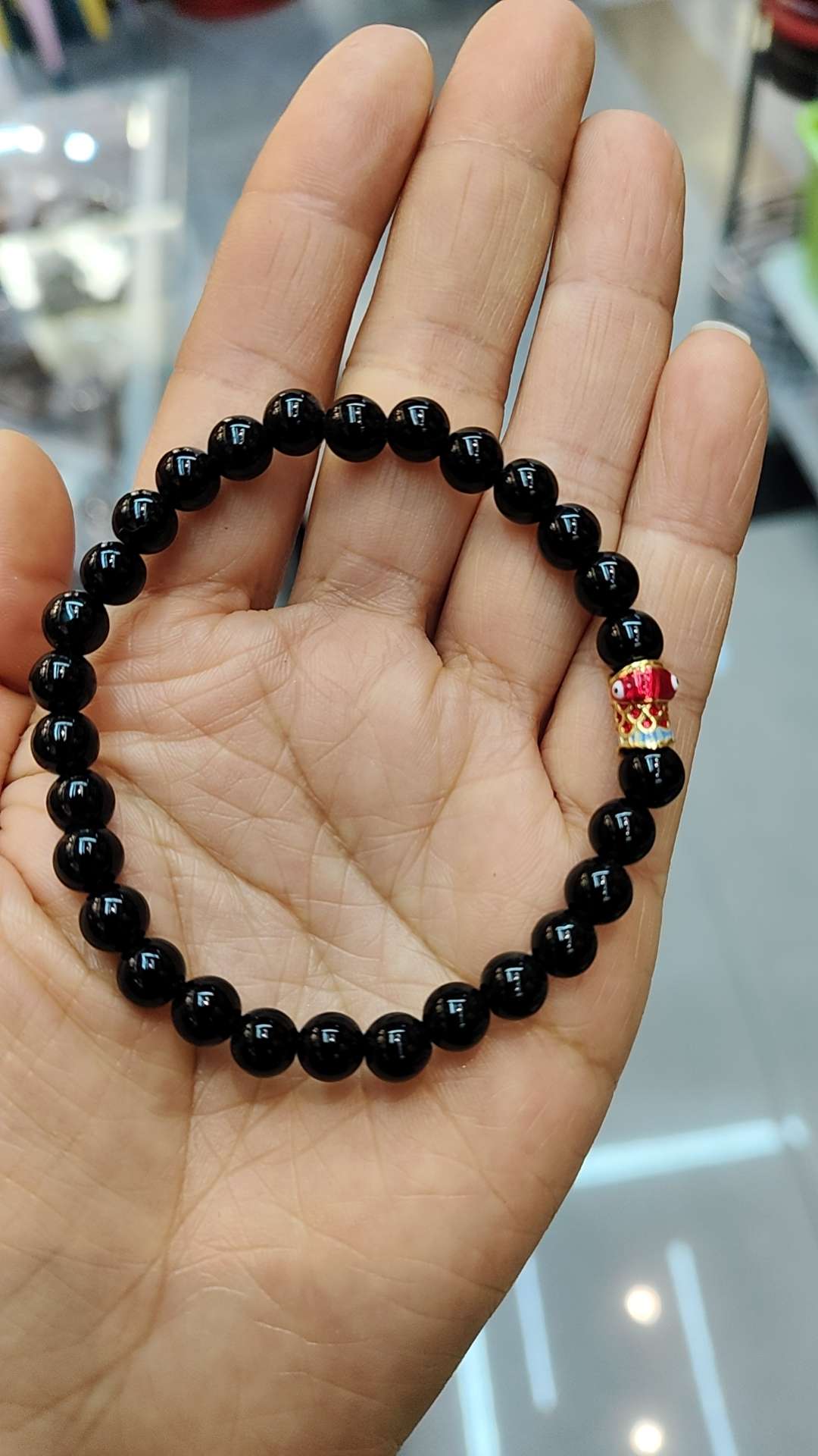 Koi carp possession + black agate bracelet