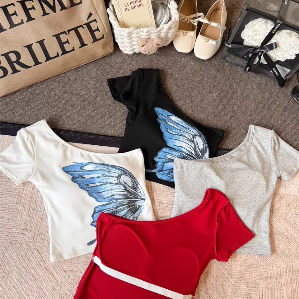 A hot girl style off-the-shoulder butterfly print short-sleeved T-shirt for women. Pair it with a short top with a chest pad for a slimming and form-fitting look in summer Item Picture