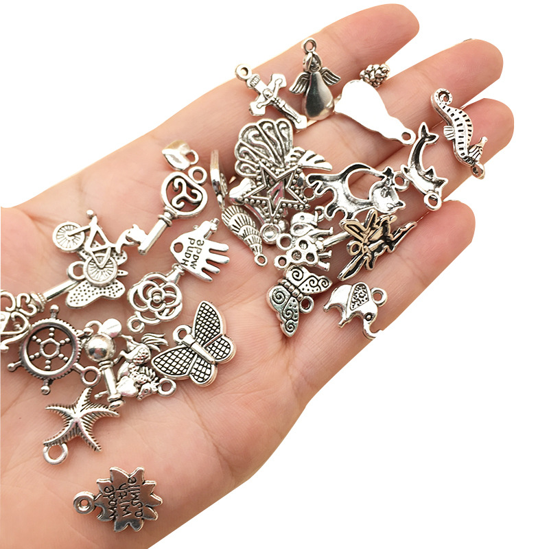 A set of 100 regular silver necklaces, bracelets, earrings, pendants and accessories for diy alloy pendants Specification image
