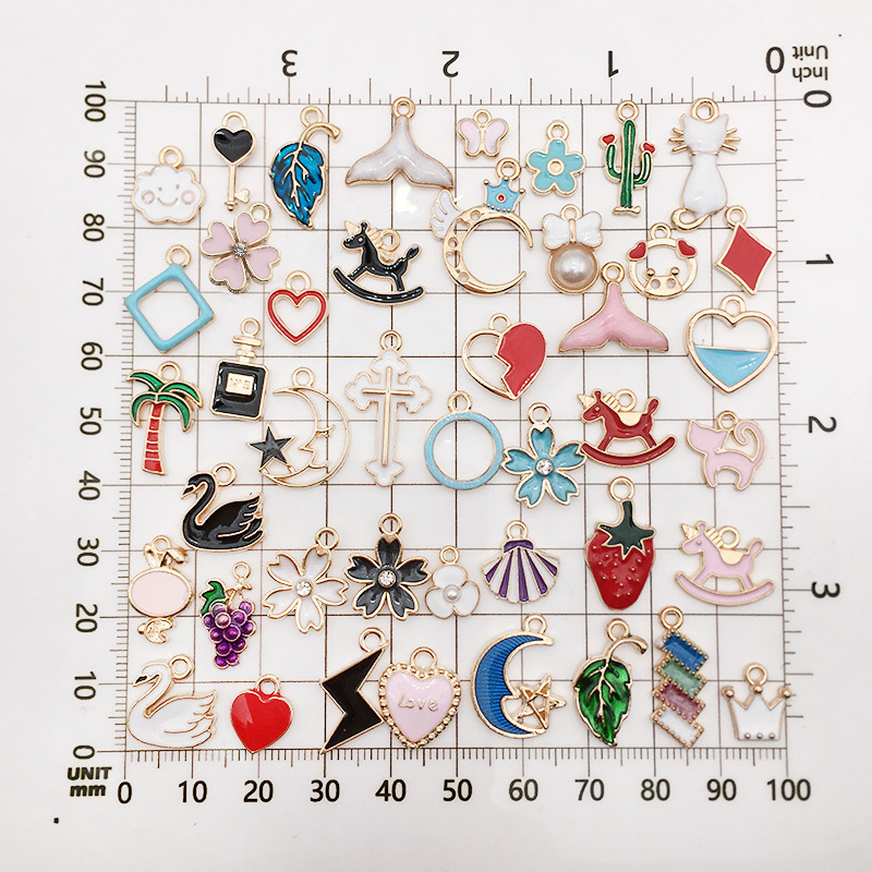 Handmade diy jewelry accessories, oil-dripping alloy small pendants, mixed sets of 100 types of bracelet pendant accessories, materials and auxiliary materials Specification image