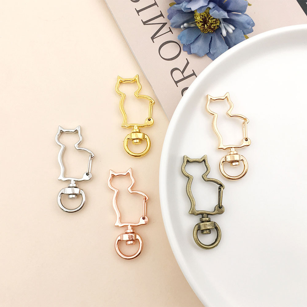 Color-preserving hanging plating heart-shaped keychain accessory diy decoration plum blossom cloud five-pointed star dog buckle moon-shaped hook buckle Application Scenario