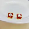 New Year's red, small and exquisite four-leaf clover stud earrings, with a trendy and stylish design, are high-end and simple. They are versatile new earrings and pearl necklaces Specification image
