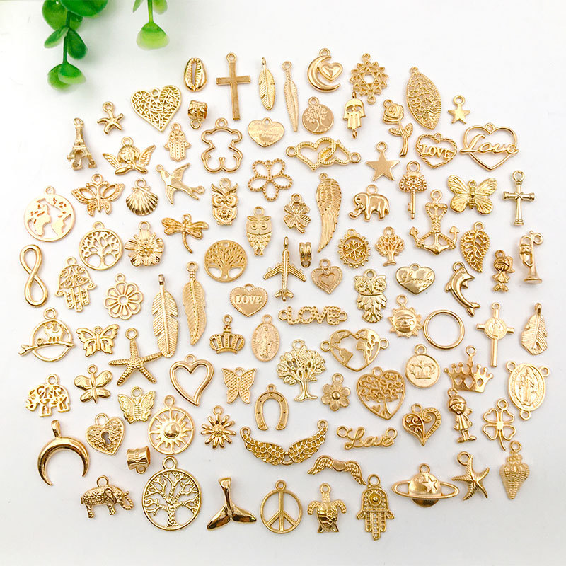 A collection of 100 KC gold alloy pendants, pendants, bracelets, necklaces, and other diy jewelry accessory materials details Picture