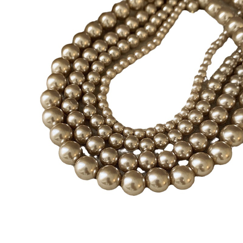 French retro high-end pearl necklace, fashionable, niche and versatile sweater chain, light luxury and individual design sense necklace for women Item Picture