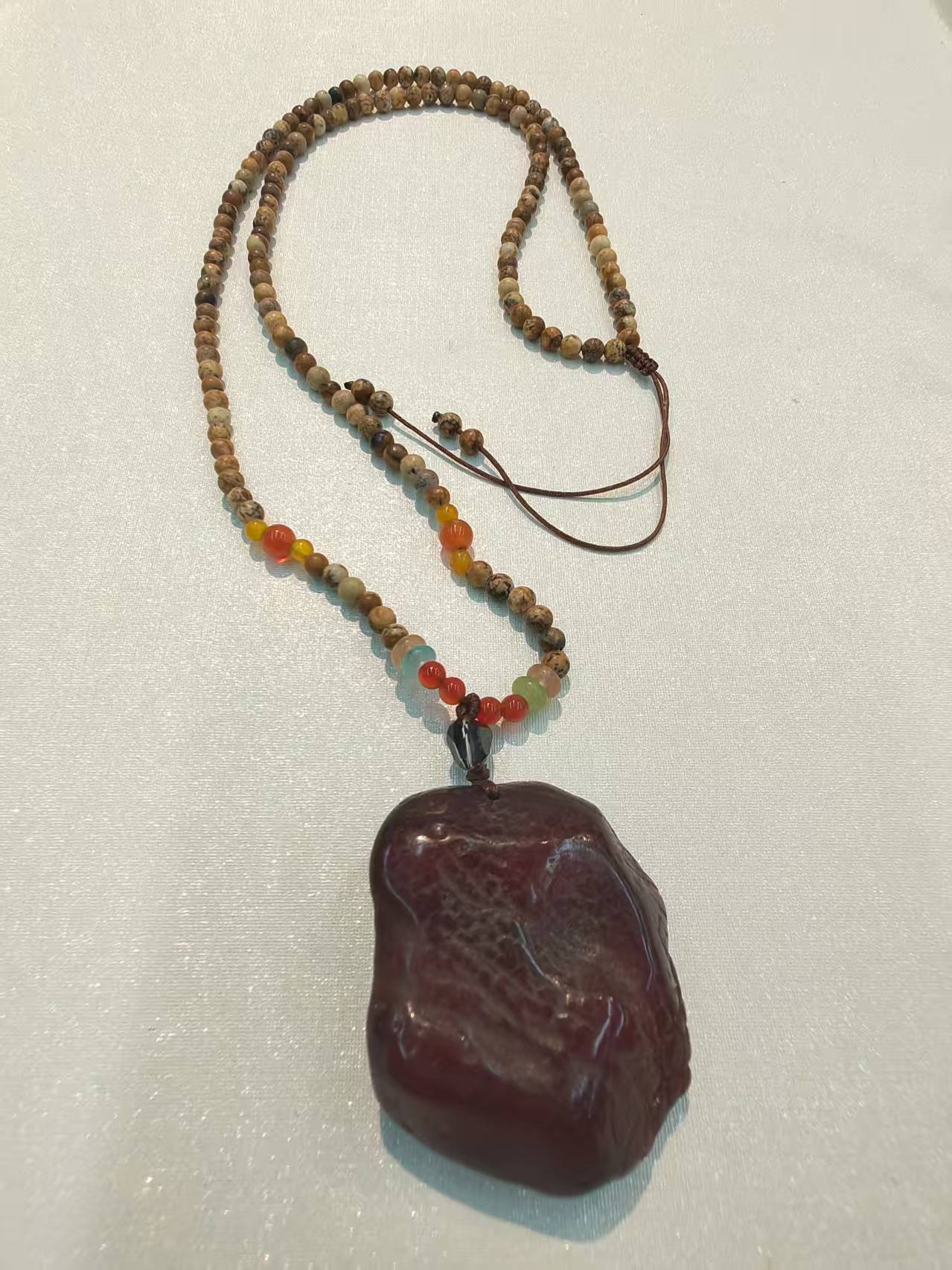 带皮蜜蜡原石项链手把件