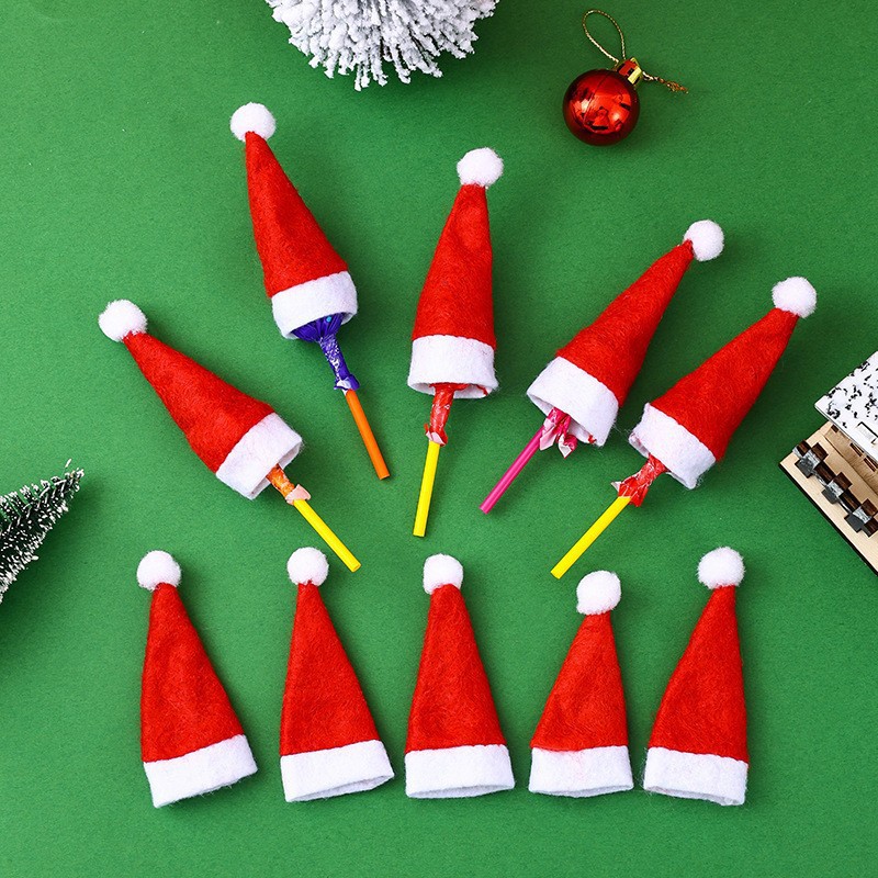 Christmas decorations: mini Christmas hat, Christmas wine bottle cap, flannel small cap, knife and fork cover details Picture