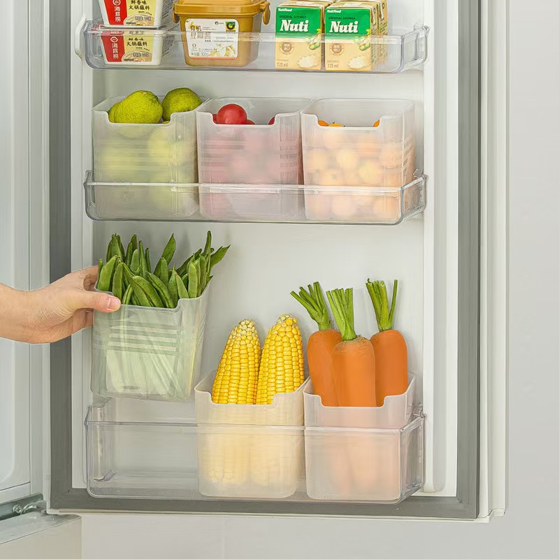 A spacious and multifunctional storage box for fruits and vegetables on the side of a refrigerator, suitable for home use. Specification drawing