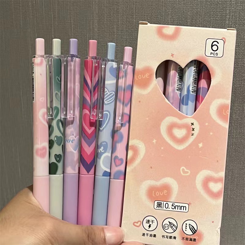 Fresh and heart-shaped gel pens, high appearance level, simple and girlish heart, press pen st head, student exam black pen and gel pen wholesale