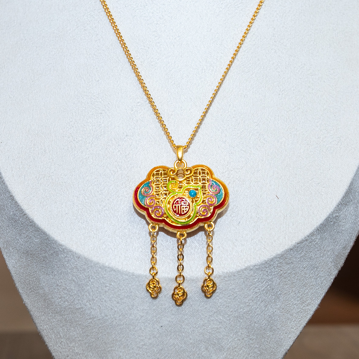 A traditional Chinese gold "Fu" character hand-carved, gold wrapped in silver and inlaid with auspicious clouds to bring good fortune, gold enamel pendant necklace Specification image