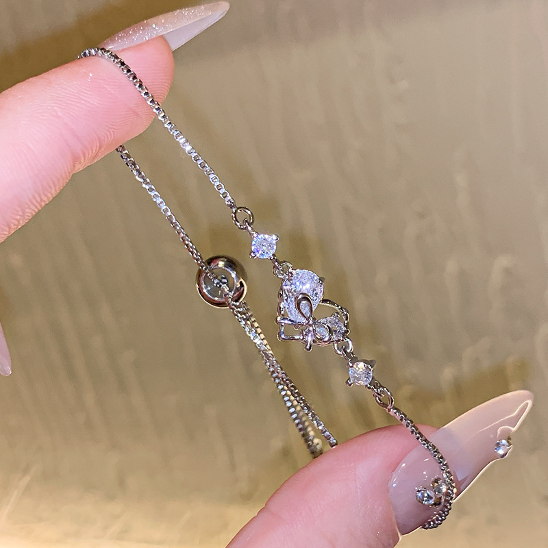 Wholesale of 2024 new asymmetrical diamond-encrusted heart-shaped bracelet for women, a fashionable, niche and high-end pull handle bracelet Specification image