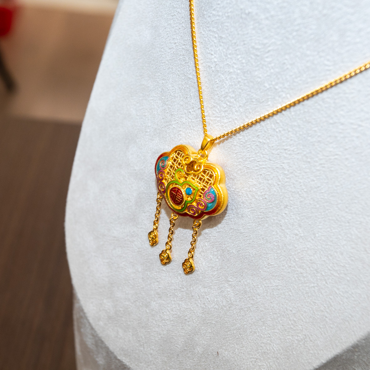 A traditional Chinese gold "Fu" character hand-carved, gold wrapped in silver and inlaid with auspicious clouds to bring good fortune, gold enamel pendant necklace Item Picture