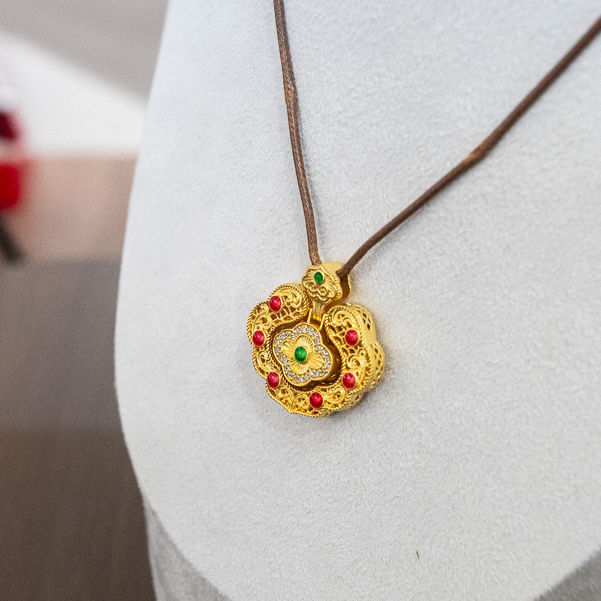 Gold gemstone inlaid pendant, gold wrapped in silver, court gold hollowed-out pattern brocade ruyi lock silver jewelry accessory, auspicious cloud bringing good fortune gold enamel pendant Application Scenario