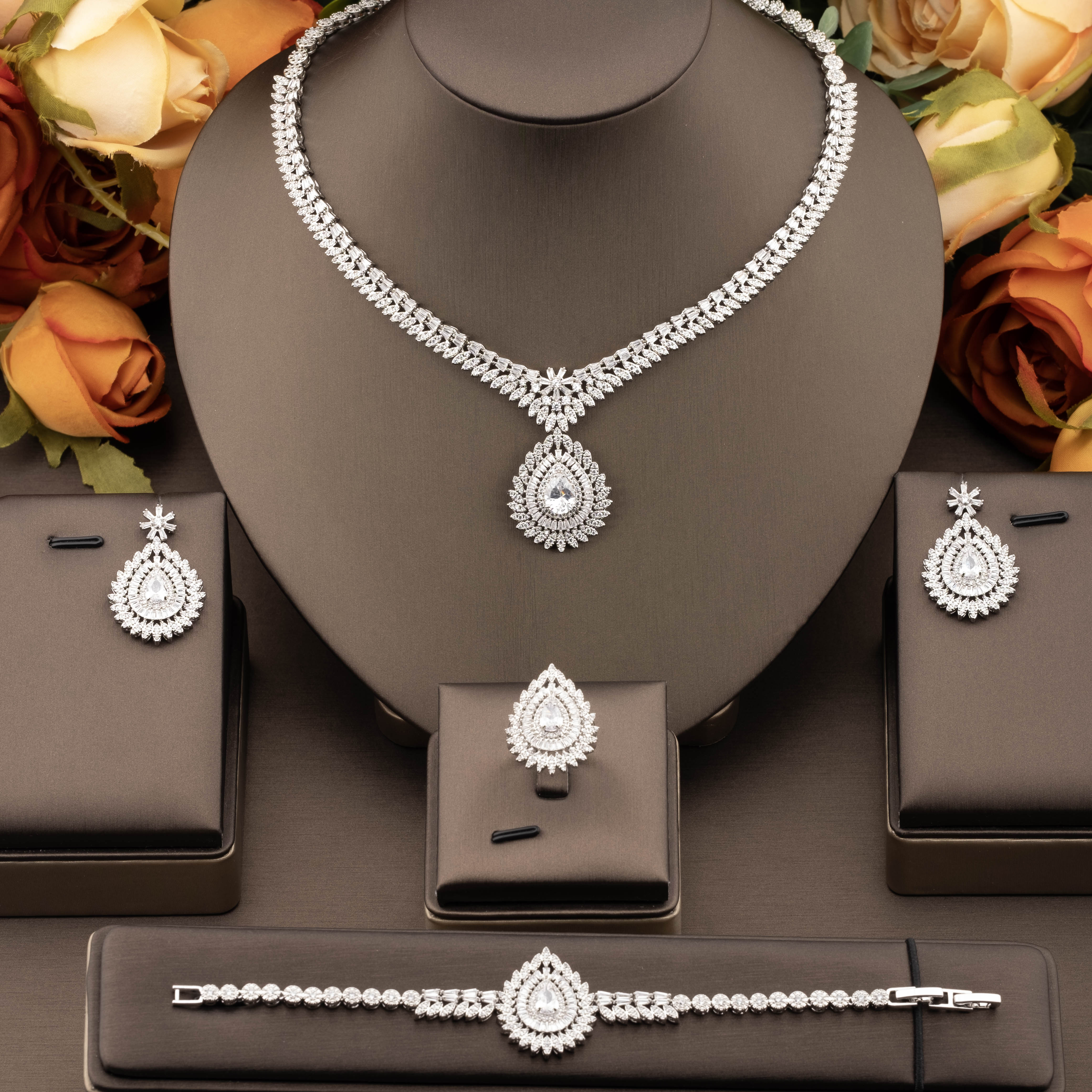 A luxurious jewelry set with sparkling cubic zirconia flower clusters is suitable for ladies to wear at wedding banquets
