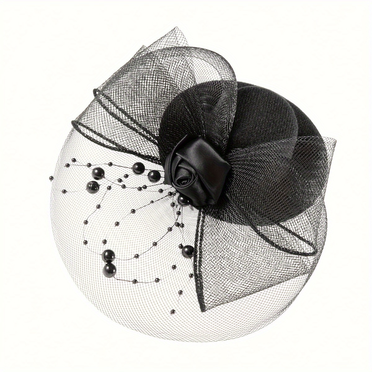 A hand-decorated hat with feather, flower and tulle for ladies is suitable for carnival, Christmas, Halloween, tea parties, birthdays, horse races, wedding headwear, Derby hats and church hats. It features a clipper design details Picture