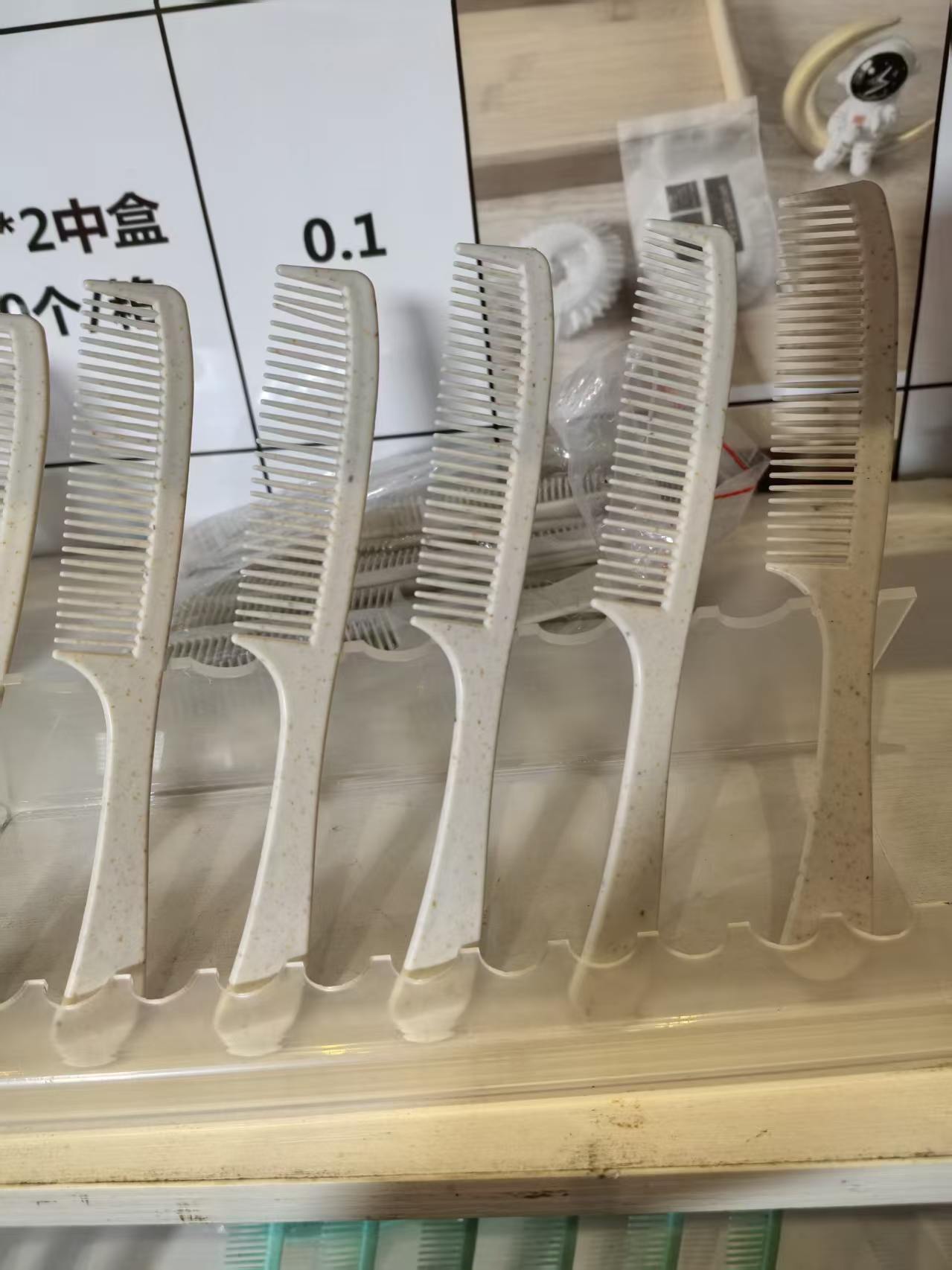 日用百货一次性梳子梳子便携防静电塑料梳子