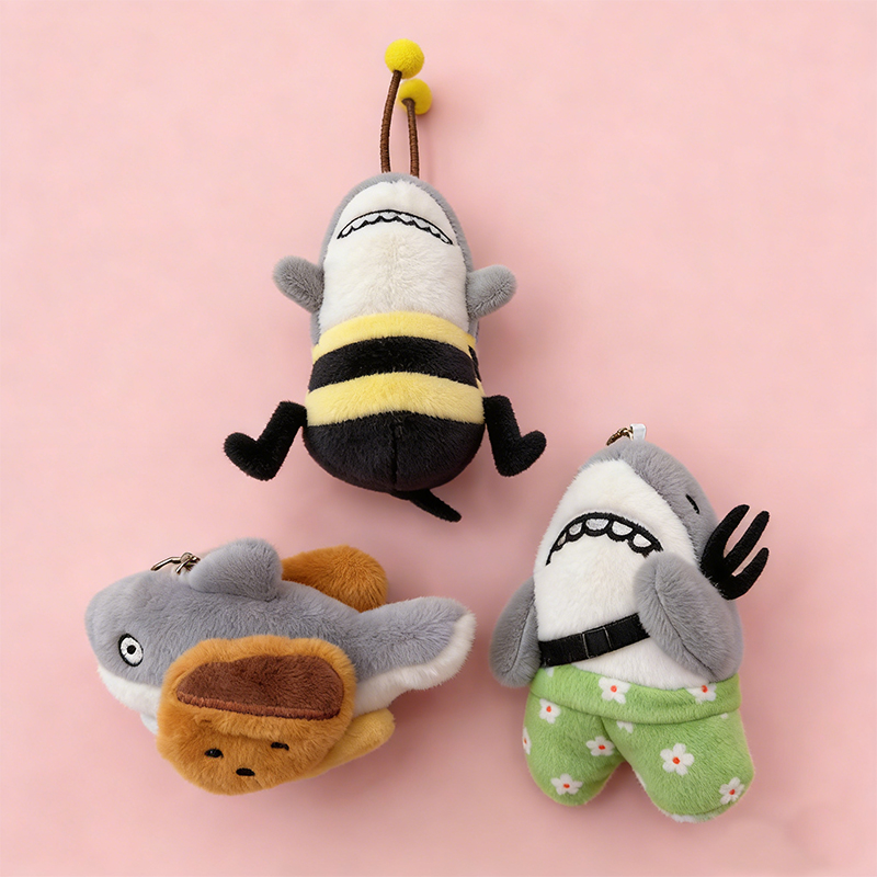 Shark carvings, shark honey, shark forks, parodies, plush toys, creative dolls, cartoon accessories, plush figurines, keychains, cloth dolls, cute decorations, gifts, claw machine factory direct sales