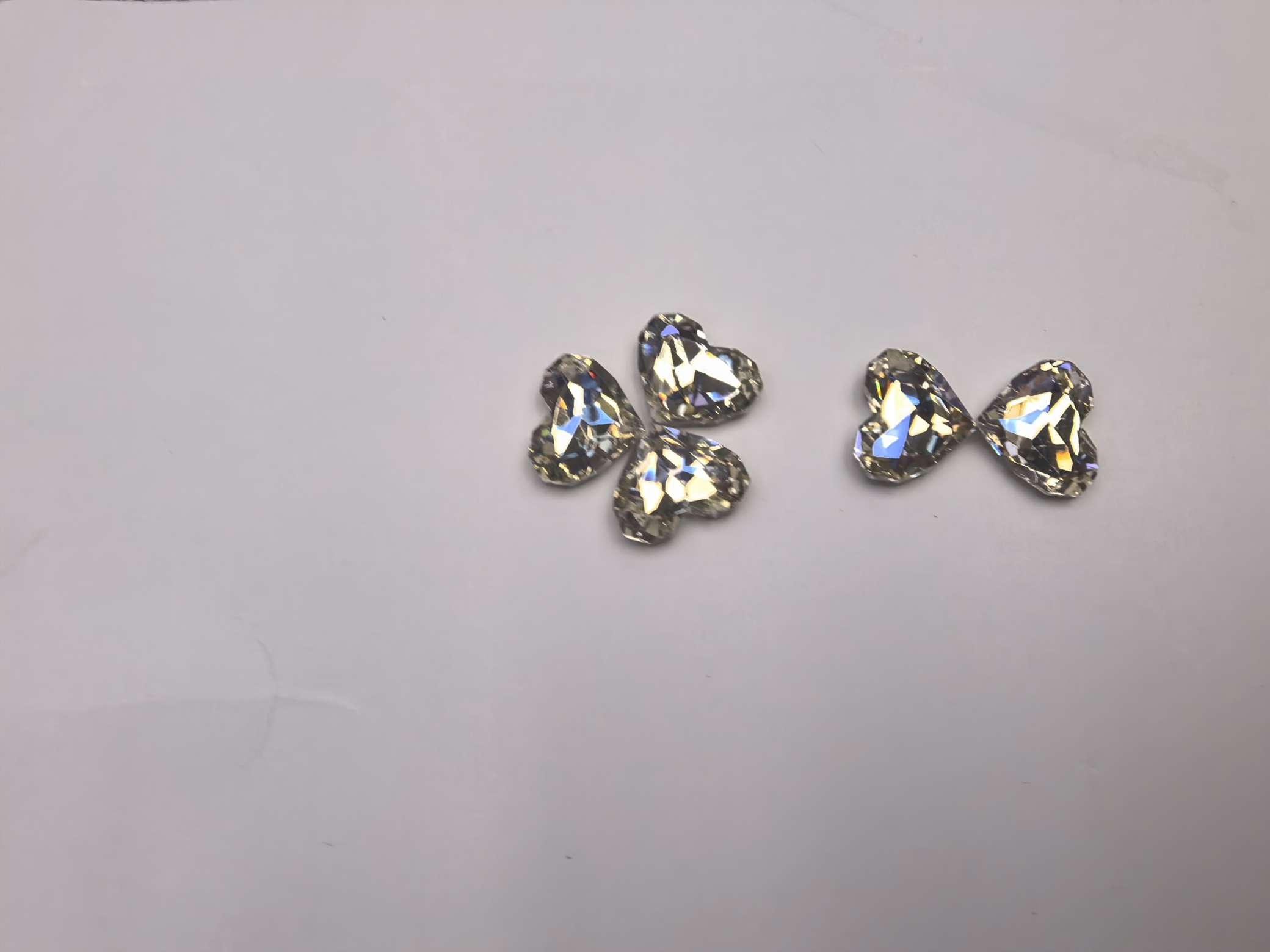 锦利水晶闪烁白系列005型号是镀平面15*18几何桃