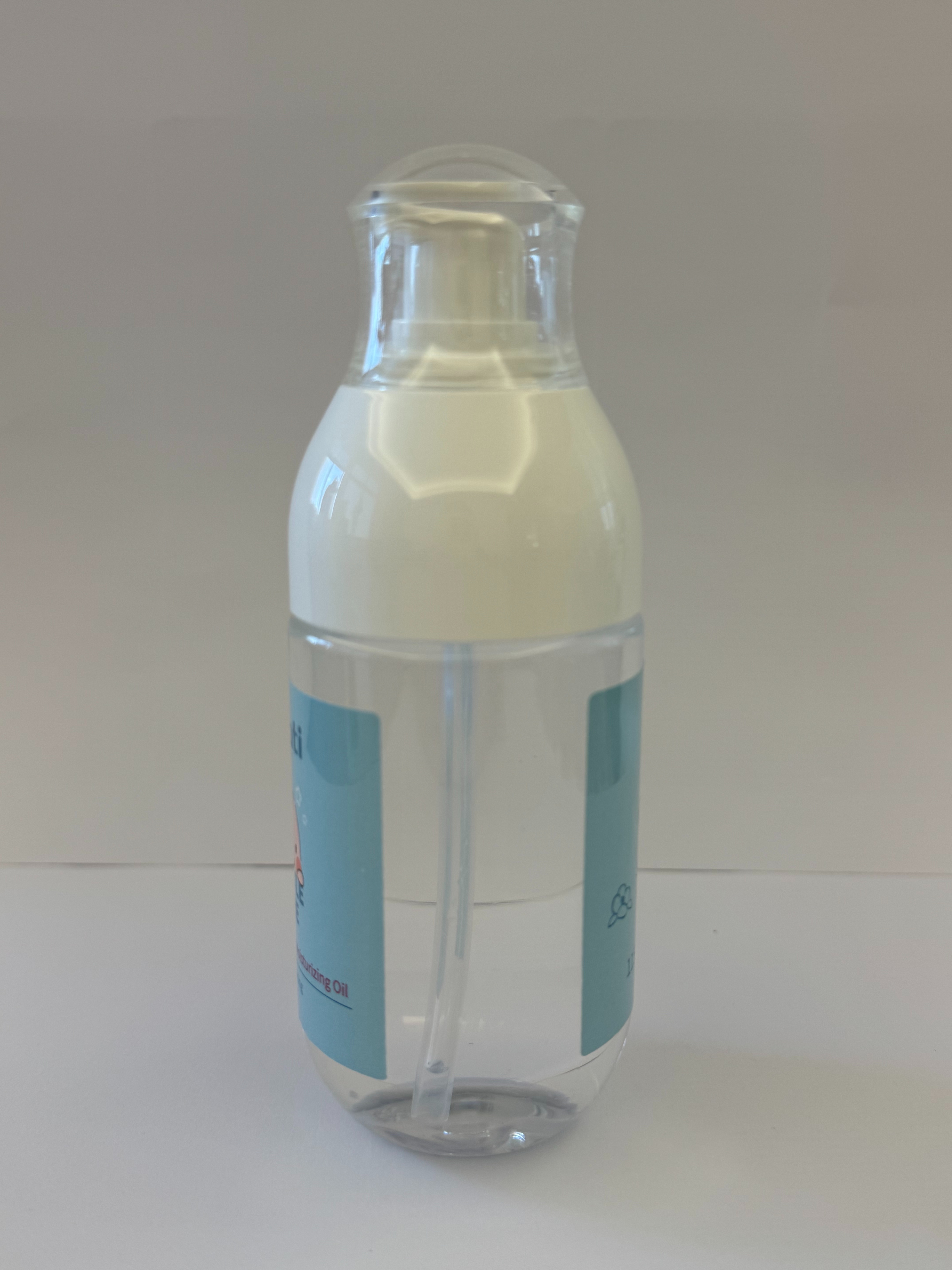 Baby moisturizing oil bottle children 's care and skin care products moisturizing and nourishing gentle care for baby' s skin coati moisturizing oil 115ml touch oil Specification image