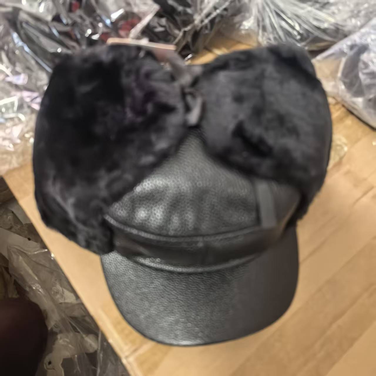 Saixue Winter warm thickened leather hats, senior hats, windproof and waterproof clothing accessories, one-piece hats, morning and night market wholesale 123 details Picture