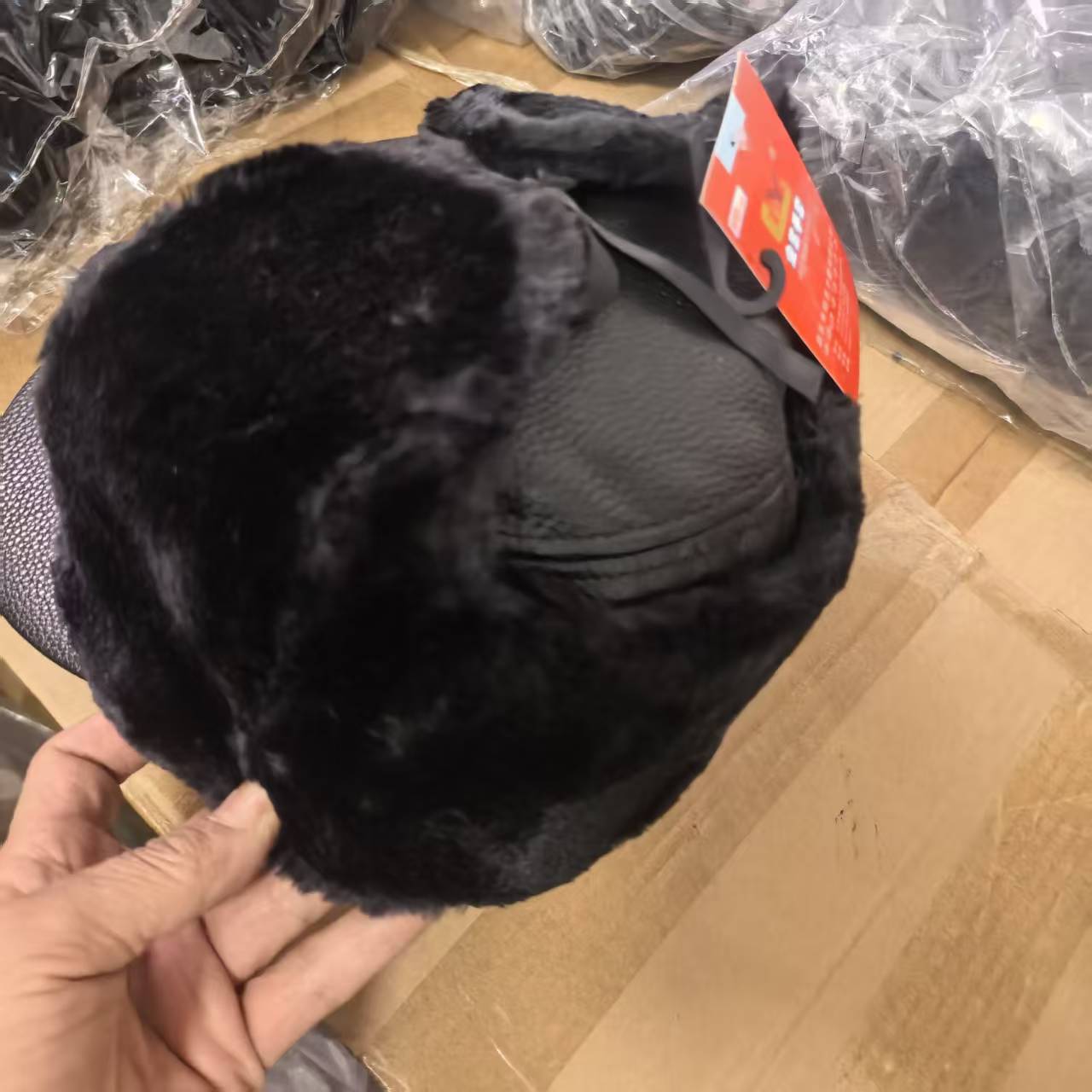 Saixue Winter warm thickened leather hats, senior hats, windproof and waterproof clothing accessories, one-piece hats, morning and night market wholesale 123 Item Picture