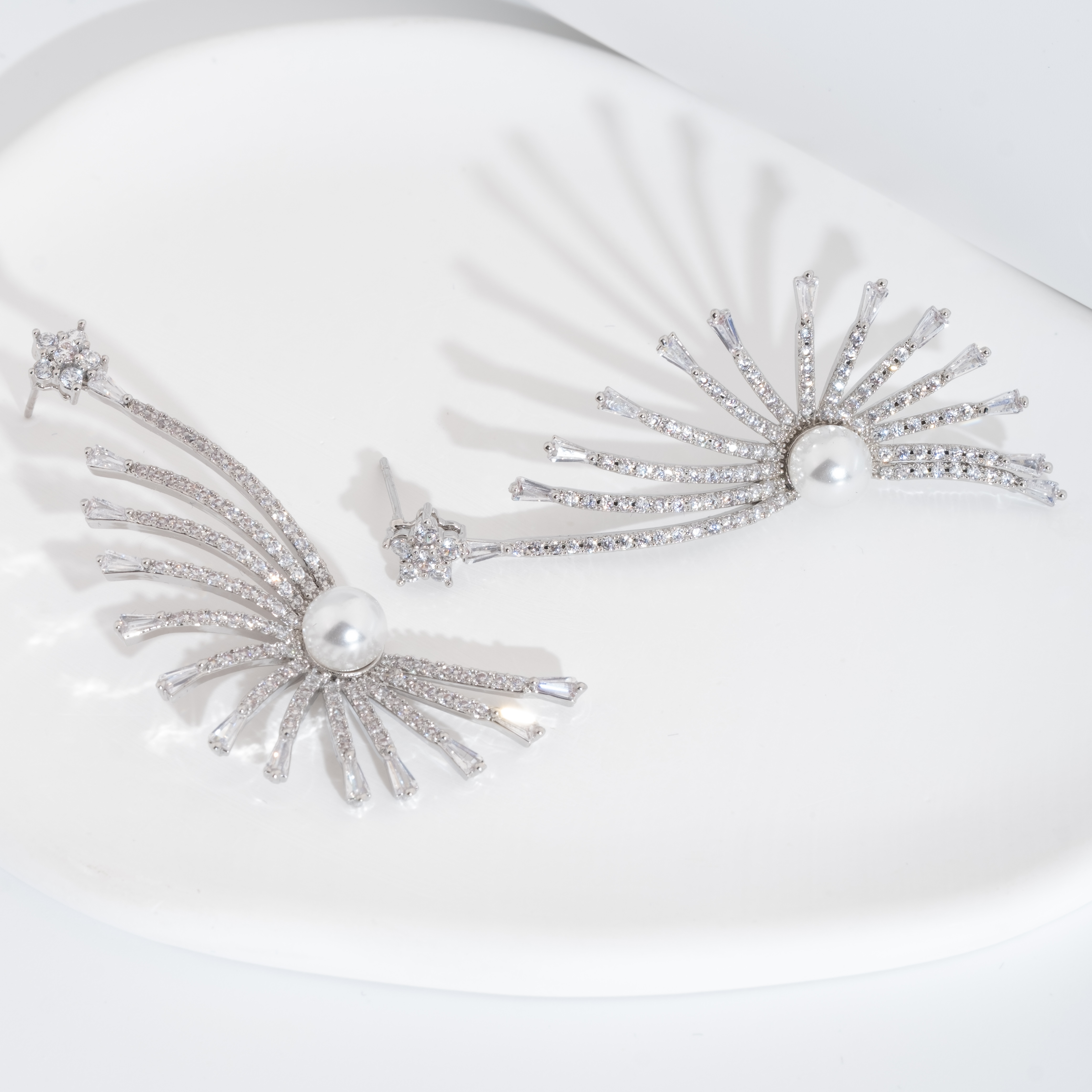 A set of luxurious and dazzling cubic zirconia peacock sping-out design earrings is suitable for women to wear at weddings Application Scenario