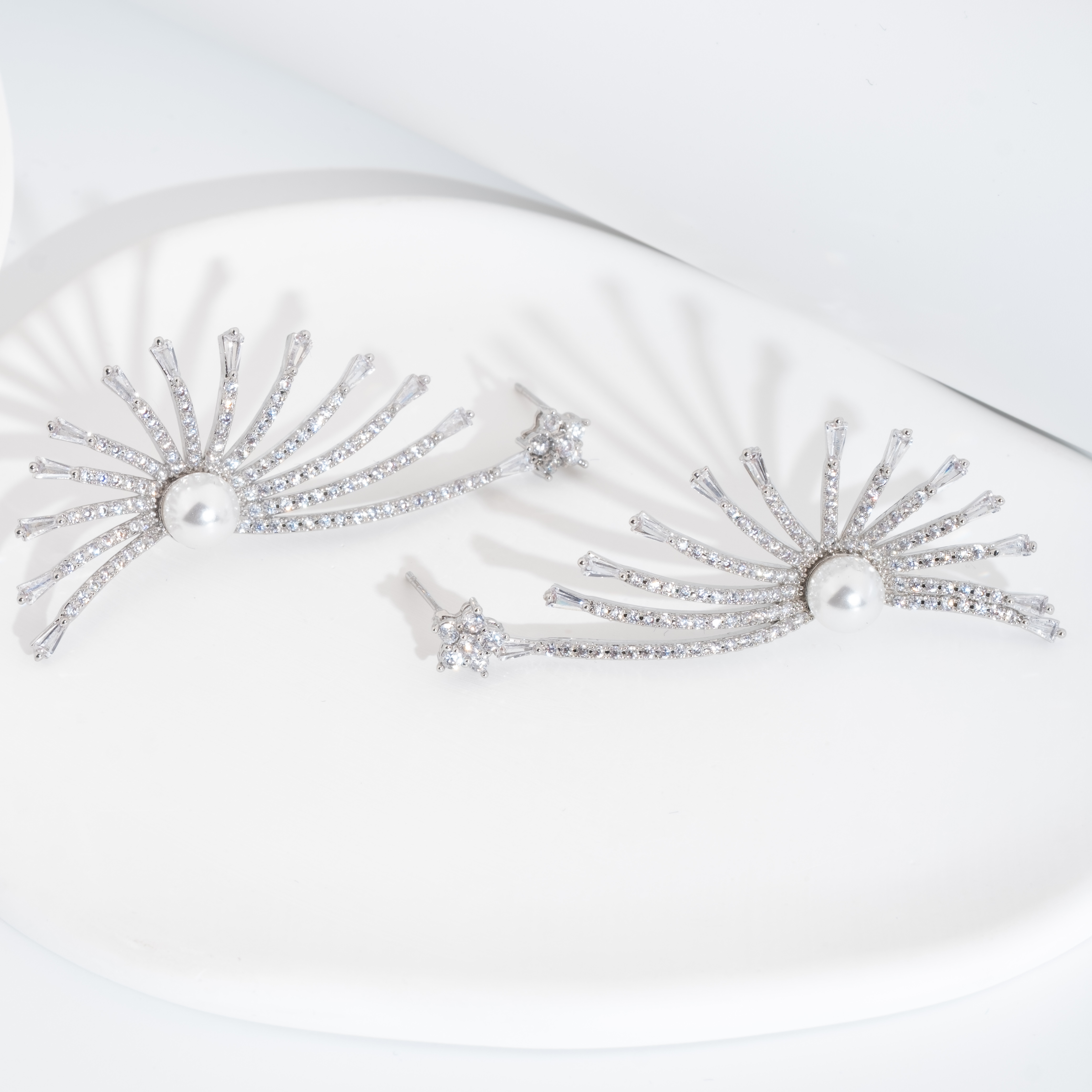 A set of luxurious and dazzling cubic zirconia peacock sping-out design earrings is suitable for women to wear at weddings Specification image