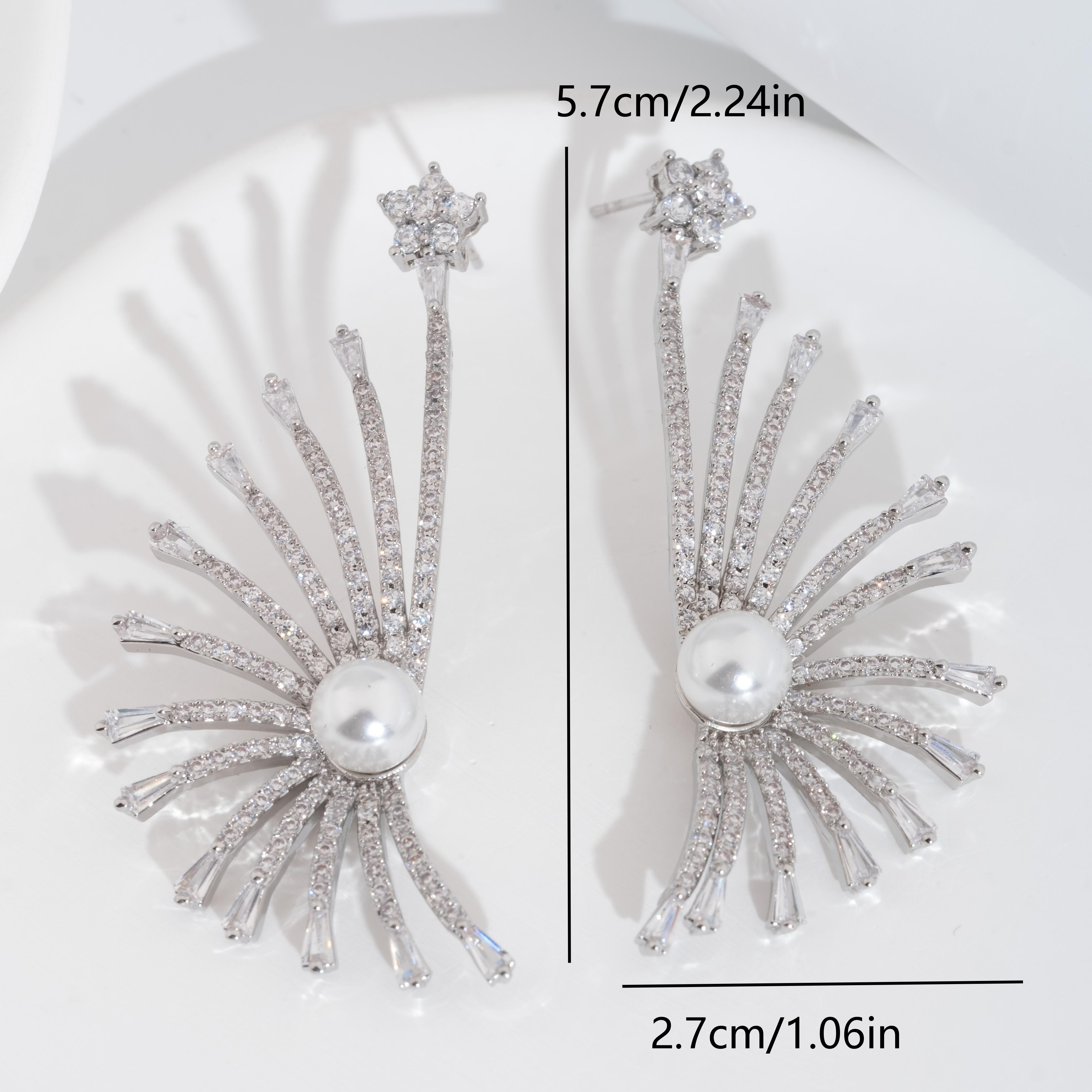 A set of luxurious and dazzling cubic zirconia peacock sping-out design earrings is suitable for women to wear at weddings Item Picture