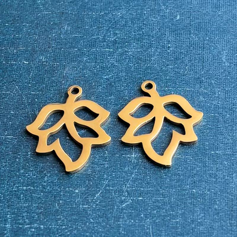 Stainless steel four-leaf clover maple leaf bracelet pendant, hollowed-out small tree titanium steel leaf necklace, diy handmade jewelry accessory details Picture