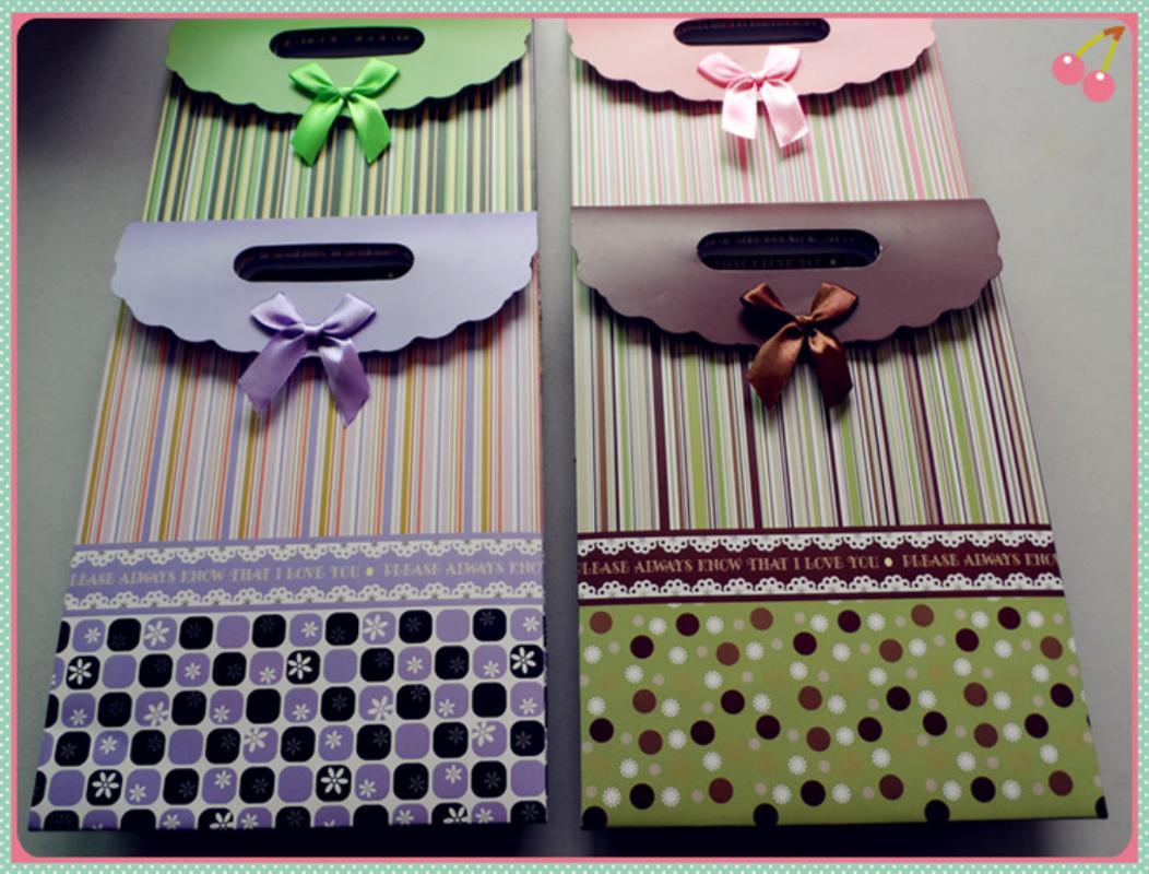 彩色条纹图案圆头礼盒定制礼盒纸制品塑料圣诞礼品袋Bag