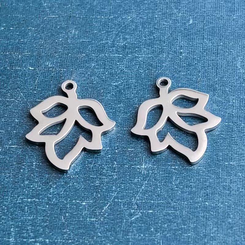 Stainless steel four-leaf clover maple leaf bracelet pendant, hollowed-out small tree titanium steel leaf necklace, diy handmade jewelry accessory