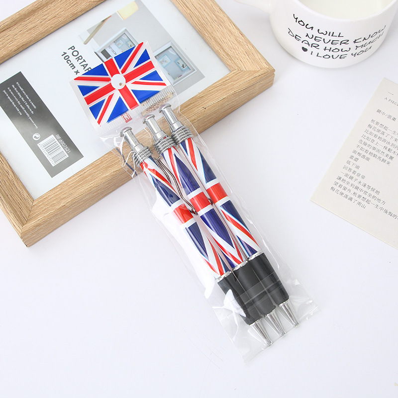 Steel clamp cross flag ballpoint pen, press-type plastic press ballpoint pen, heat transfer ballpoint pen, creative advertising promotion ballpoint pen, can be made into logo national flag pen Item Picture
