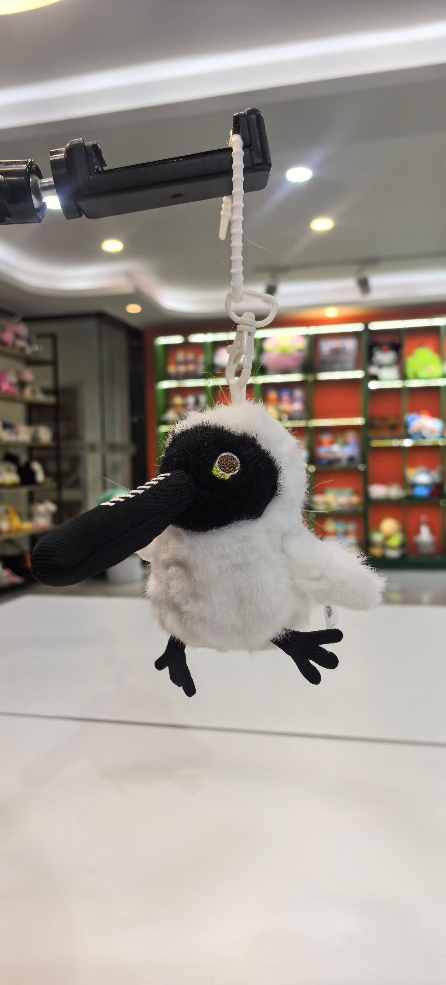 Cross-border bestseller Kuanghai Doudou Bird electric cat toy, sound-making simulation birds, birds, sparrows, black phoenixes, parrot nests, singing recording, wing-flapping birds, plush toy pendants, fledings detail image 6