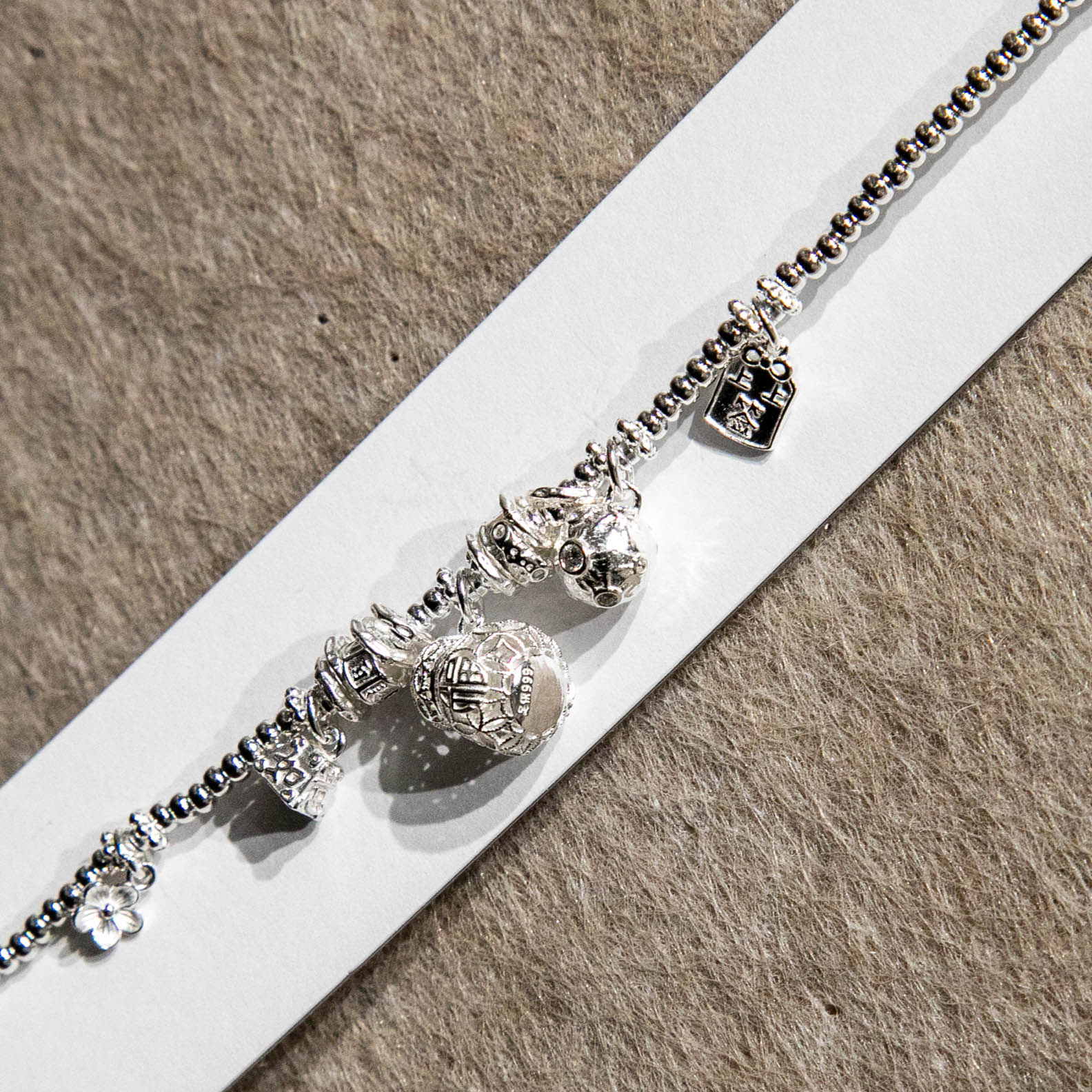 Fashionable and exquisite S925 plain Silver Wealth-Attracting Fortune Cat · Ruyi Fu Pendant Brocade Flower Bell Dynamic Beaded 925 Silver bracelet Application Scenario