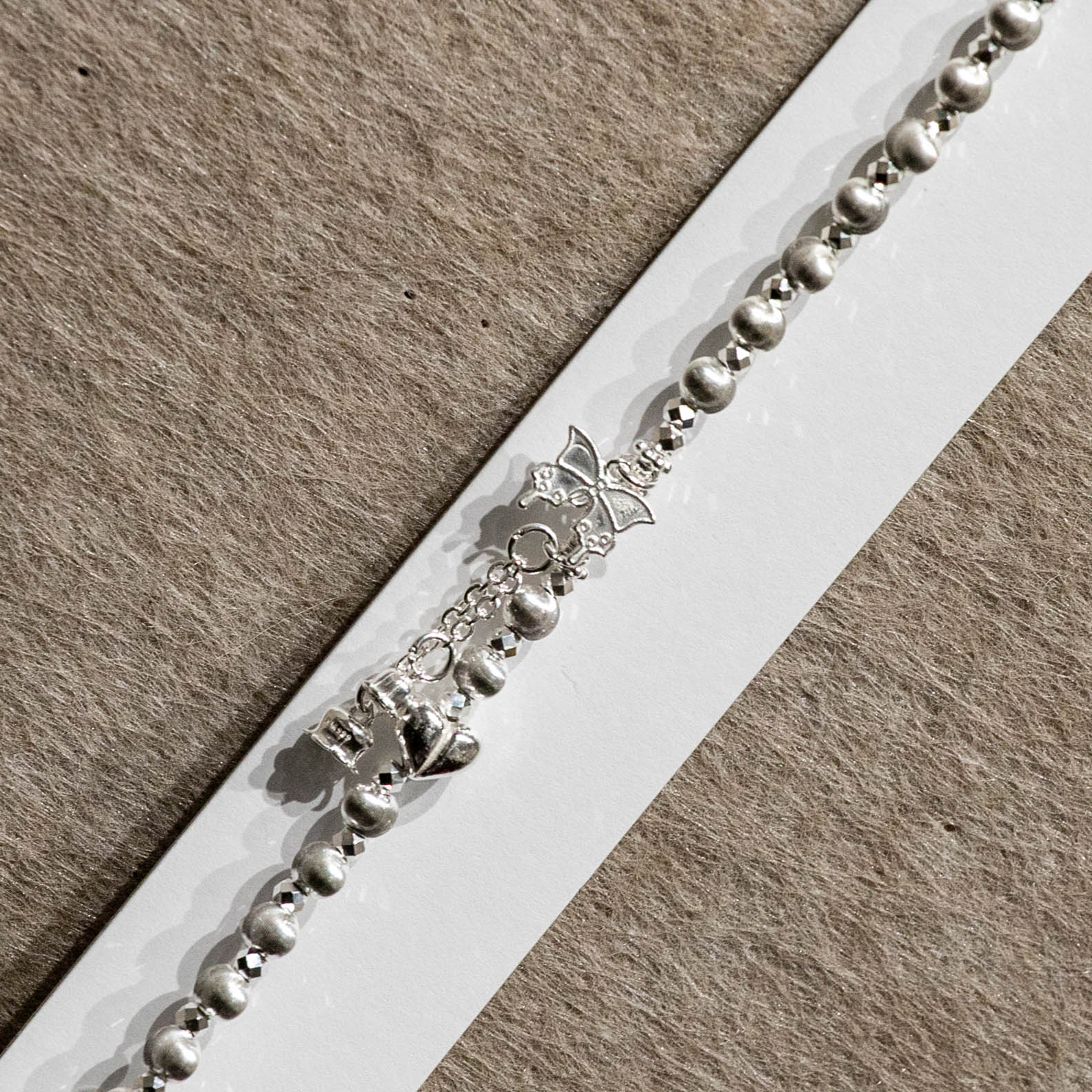 Fashionable and exquisite Bow ·925 Silver Sweet and Cool Dynamic Beaded Chain Sweet and Cool, popular design sense, Whitening High-end silver jewelry bracelet Application Scenario