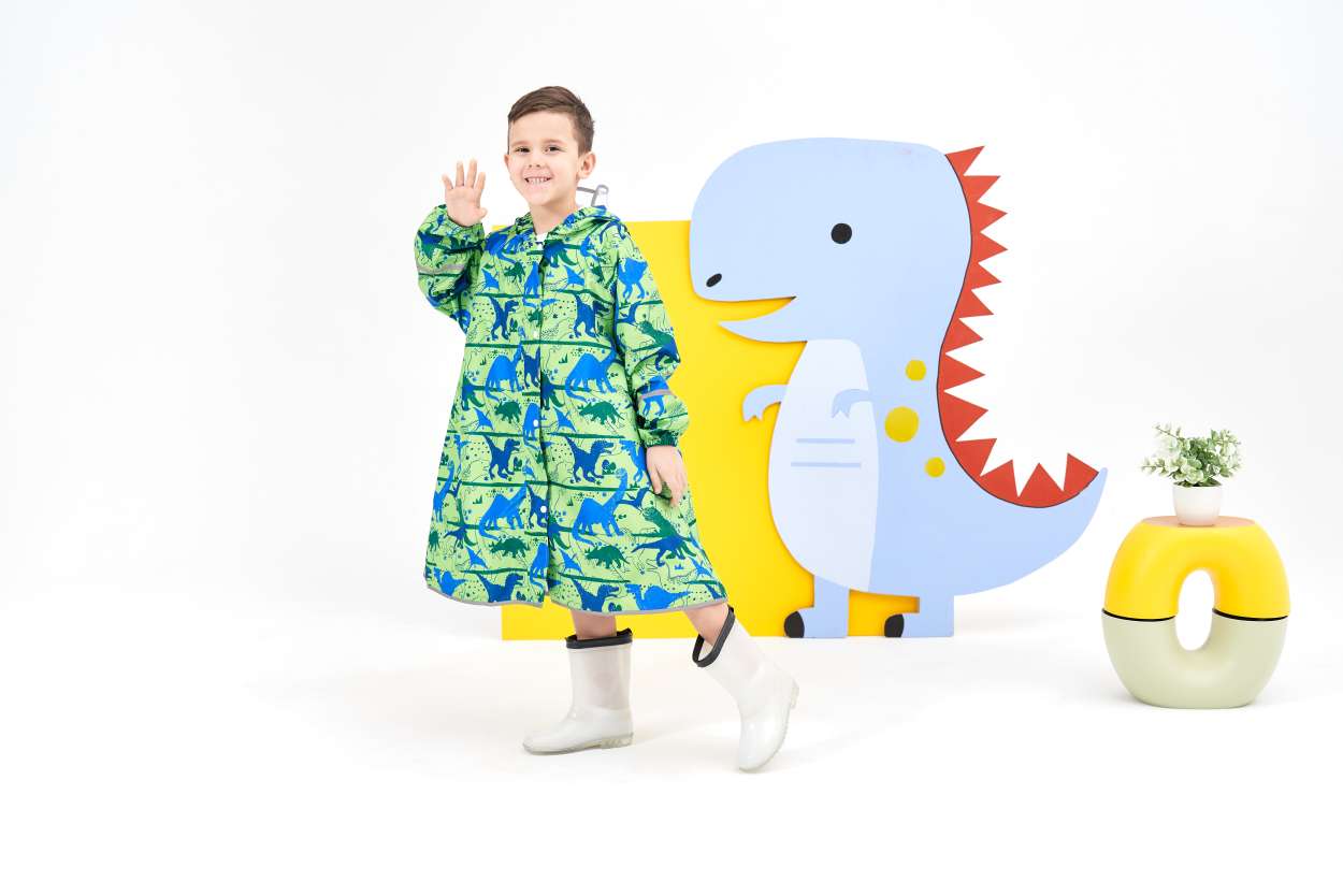 儿童背包雨衣满印卡通图案学生男孩女孩上学通勤反光安全防暴雨多尺码可选环保无气味柔软布料时尚网红宝妈必选雨衣【史前巨兽】