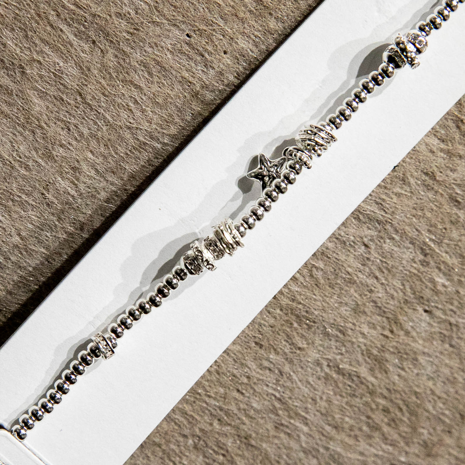 Fashionable and exquisite Star Language Flowing Light 925 Plain Silver Star Pendant beaded bracelet for women - Light Luxury, Niche, dynamic and whitening design sense jewelry Application Scenario