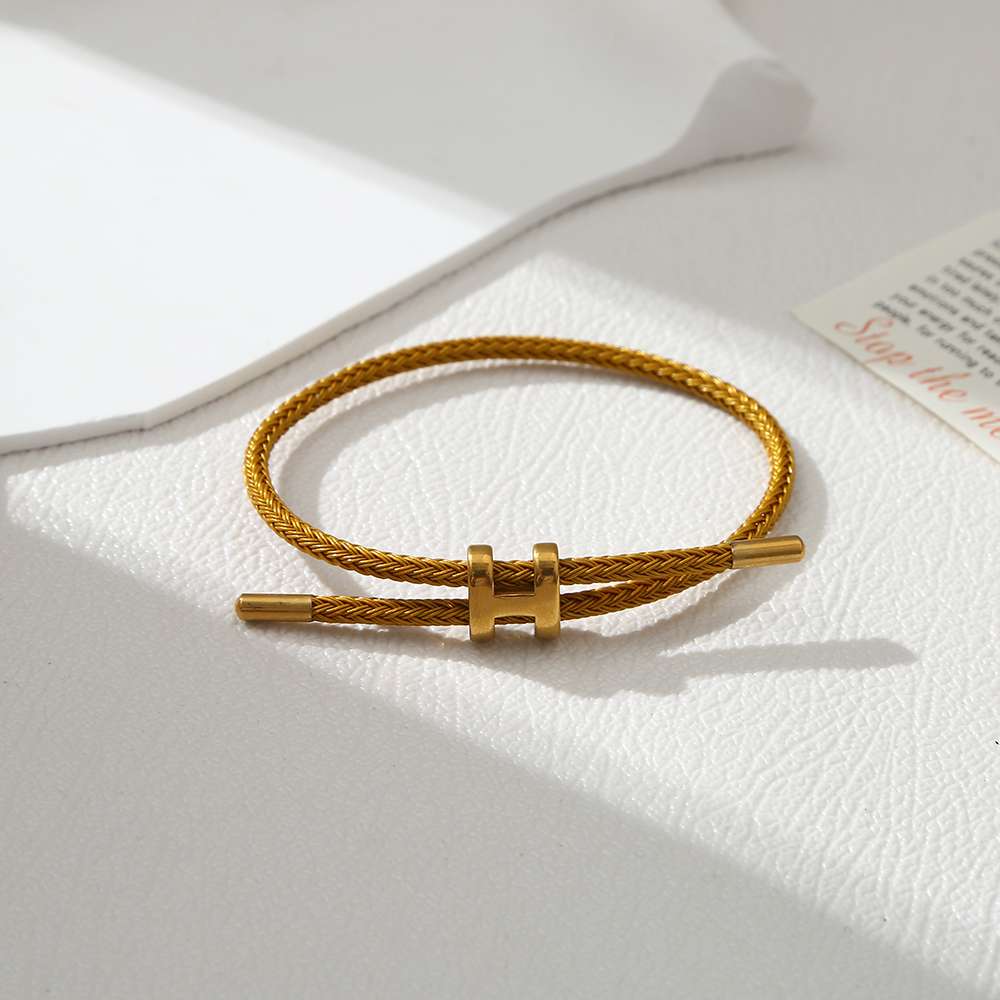 Cross-border titanium steel I-shaped buckle waterproof bracelet, stainless steel gold zodiac year braided steel wire rope, leather rope, red rope Application Scenario